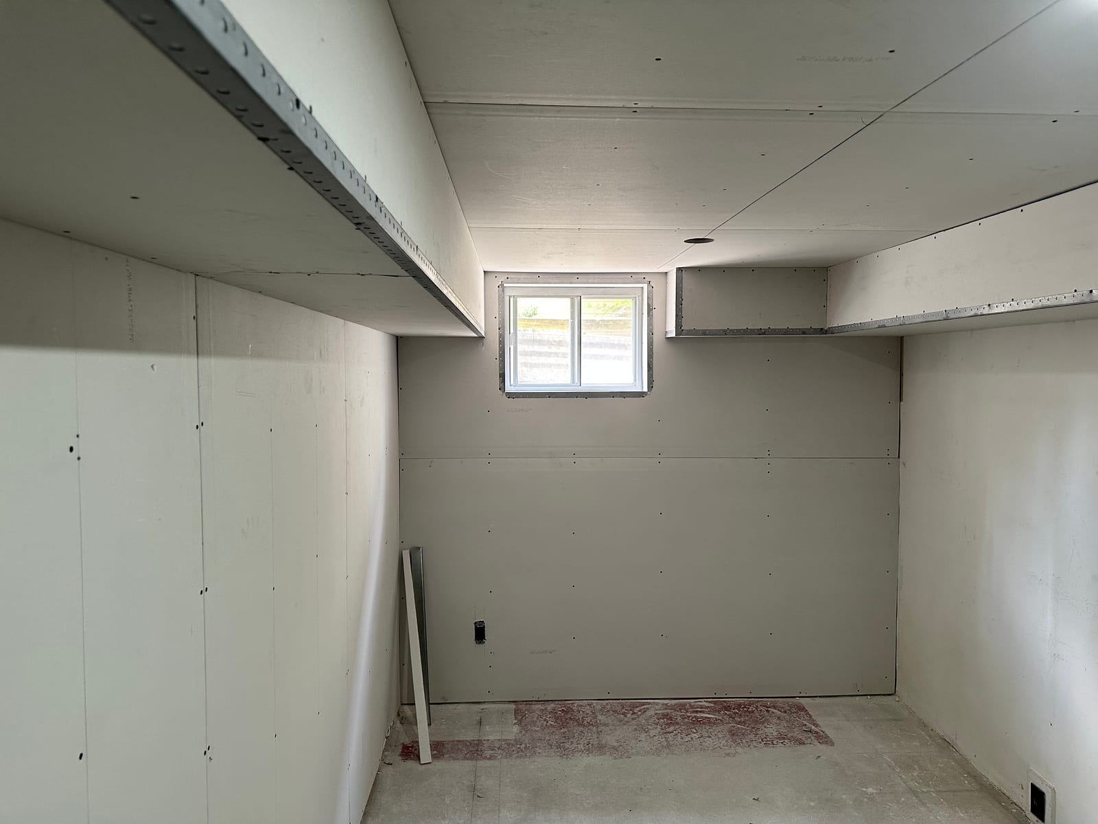 Hung drywall and bulkheads with corner bead before taping